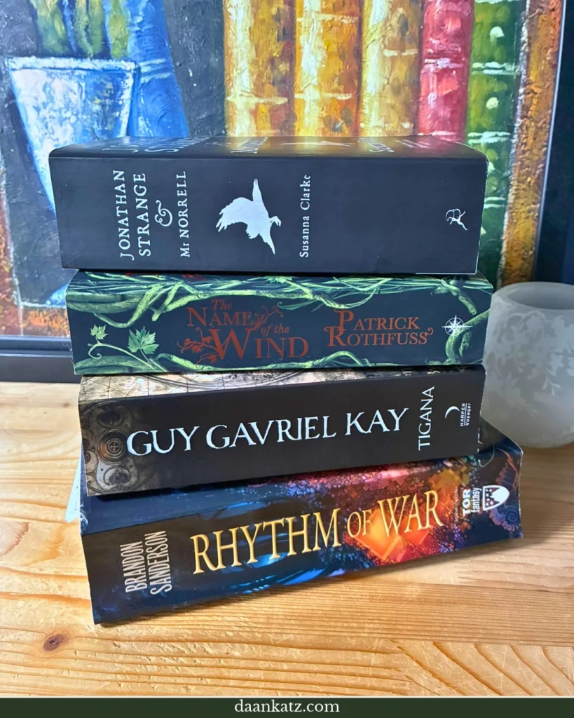 Stack of four modern fantasy novels